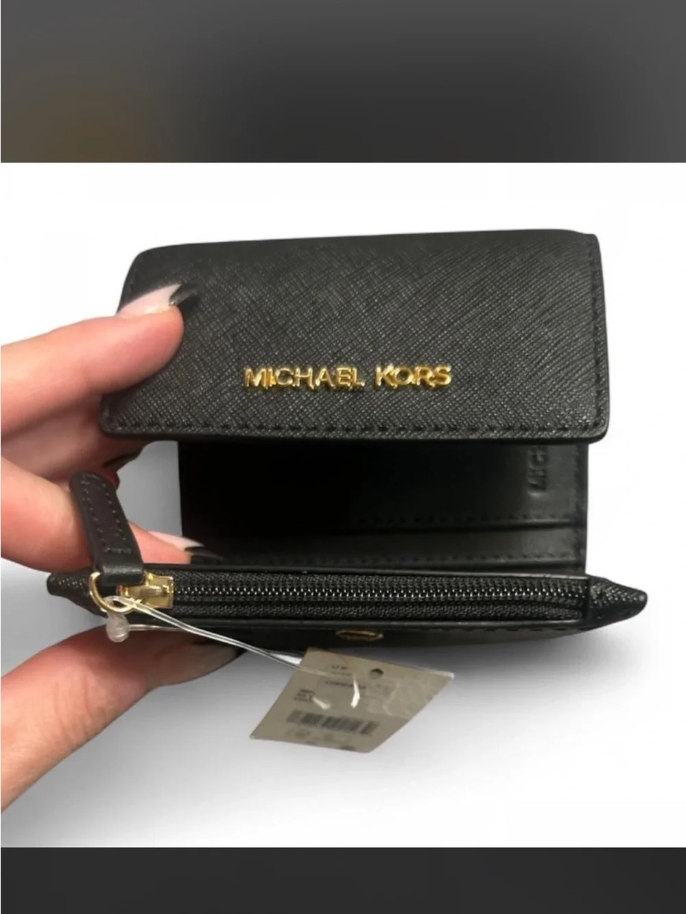 NWT Michael Kors Black Wallet With Gold tone hardware.